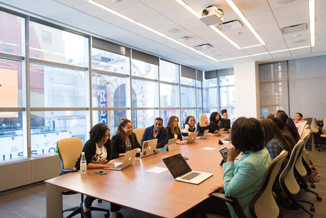 The TradingFXVault team in a strategy meeting